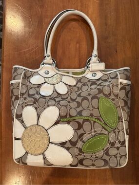 Coach Brown Signature Canvas Tote with White Floral Appliqués and Green Leaves
